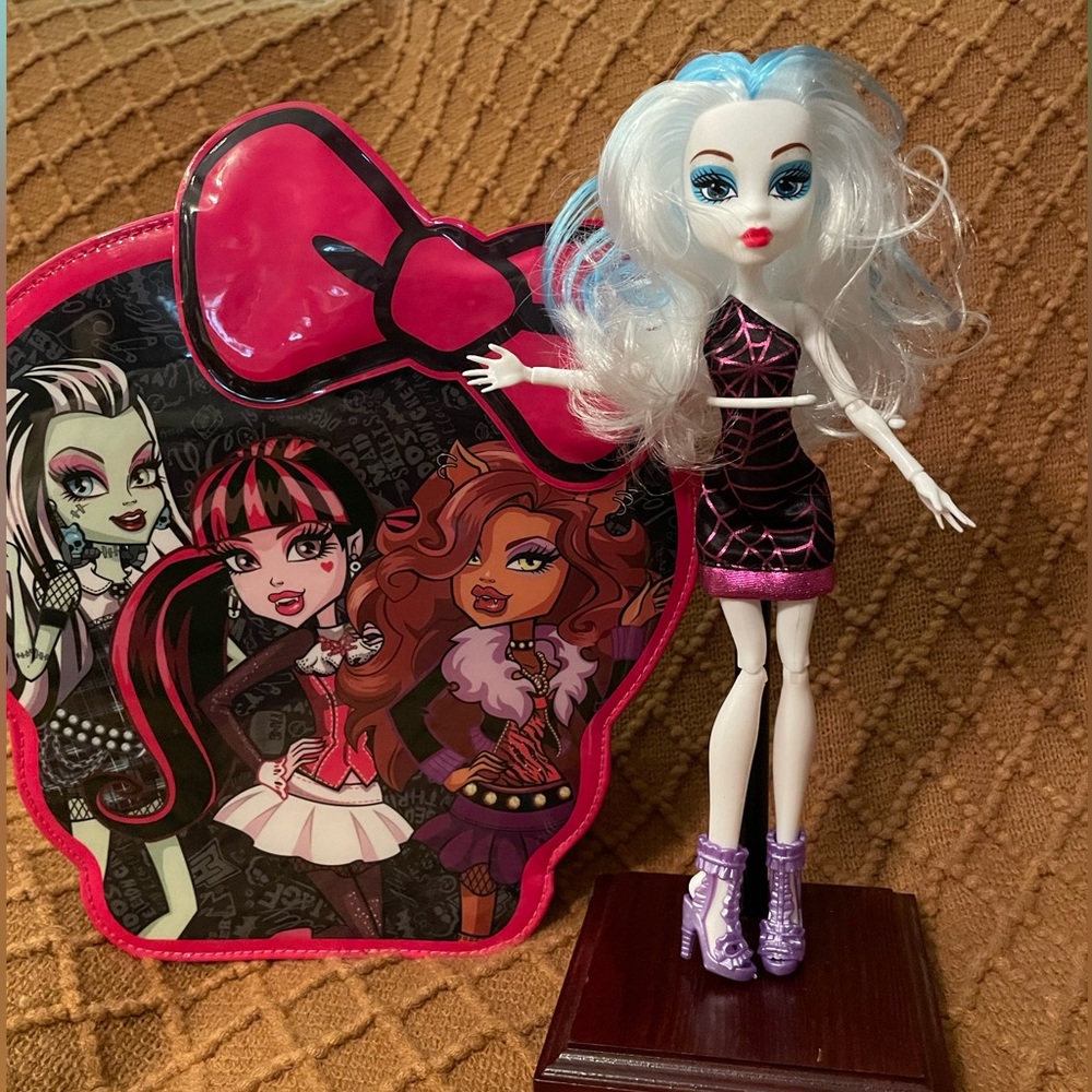 Monster High Doll. 10” tall. New. And Vintage Monster High Doll Case. No stand.